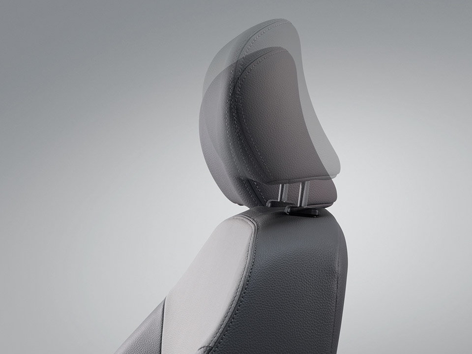 Height adjustable front seat headrest